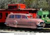 stock-photo-vintage-railcar-rides-the-rails-at-a-railroad-yard-in-northern-arkansas-28377532.jpg