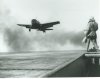AnF6F-5makesanapproachasalandingsignalofficerlooksonaboardtheUSSSableIX-81_zpsb78f9aec.jpg