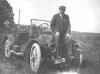 Joseph Young seated on car.jpg