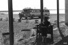 Israel - tourist taking a break, bus in background 4DFE.jpg