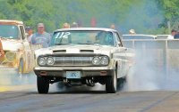 Comet in burnout at 2014 meltdown 2.jpg