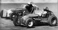 Gorden Johncock #85 and Buzz Gregory in the #11 car at New Bremen 1964.jpg