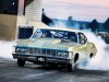 sucp_0806_07_z+1967_chevy_impala+burnout.jpg