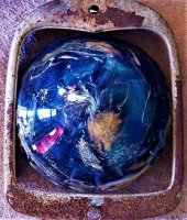 James curtis blown glass in a ford radiator shell.JPG