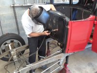 Bob welding up holes.jpg