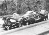 car carrier 1938 Ford 2 trucks, 1 car.jpg