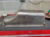 Dent Free NOS Corvette Trap Door Oil Pan.jpeg