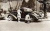 Changing tire for girl, Washington DC, 1942.jpg