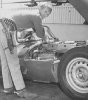 1963 Steve McQueen fixing car.jpg