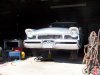a merc on blocks.JPG