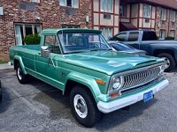 1974_Jeep_J10_pickup_truck_all-original_finished_in_green_at_2017_AMO_meet_01of12.jpg