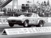 vemp_0701_12_z+drag_racing_corvettes+c2_corvette_wheelstand.jpg