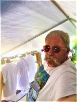 me in the booth at oshkosh (3).JPG