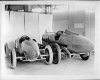 1923_Packard_race_car_with_1919_Packard_race_car,_three-quarter_rear_view.jpg