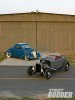 0902sr_03_z+1936_ford_coupe_1932_ford_highboy_roadster+two_hot_rods_front.jpg