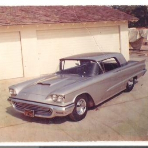 '59 Bird. I bought this Bird after seeing Junior Conway's candy red/pearl white '58. Jim Burrell, who worked for Dean Jefferies, shaved it, molded the scoop, and painted it '63 Vette Satin Silver. Dad and I formed the tube grill. True to my hot rod roots, it was powered by an Ak Miller 390. Was my daily driver for 8 years.