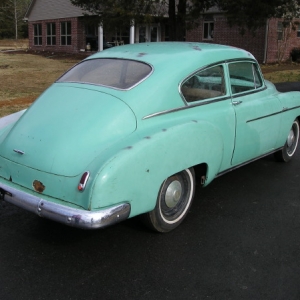 Here's how it arrived home from Kansas. I've been able to talk to every owner except the original one. The car was drug from his field in the 80's and restored. Obviously, it needs it again. :)