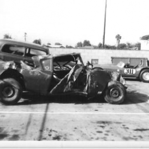 Ak Miller's Pike's Peak winning 500" Olds powered Devin in background, and a '34 Tudor that came in needing the Olds put in running order, but money never came, so it eventually left Ak's shop as it arrived.