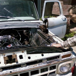 My dad (retired mechanic) helping me get the new motor running. I hear how hard it is to time ford motors...he timed it nearly perfect on the first attempt...and purring like a kitten( a mean kitten) in just a few min. Of course he started working on engines back in the 50s and was a trained mechanic by the early 60s.... He SAYS Ford kept him in business for years...I rolled my eyes as he laughs.