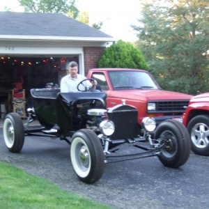 First time out of the garage!  The distracted look on my face is me listening for strange noises, scrutinizing the guages, trying to get it in the right gear and saying a silent prayer that the wheels don't fall off....Have you been there?