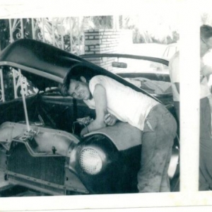 Working some more on my "J",my Dad just kind of hanging out with me,as I was redoing my J2 Rocket again and cleaning egnine bay and repaint behind grill too again.[1961]