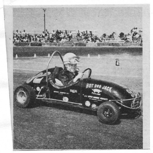 My brother Jack, Memorial day 1959. He won the 100 lapper for class B modified. Good day for the Lowe Brothers. Jack was 10.

May, '09, I have just learned that this car is alive and well. It is owned by John Gunsaulis (jadeidol on the HAMB) of Spokane, Washington! John also owns our Kurtis double deck trailer.