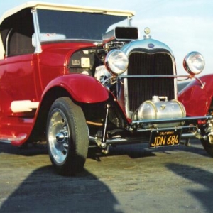 This color shot was taken by Doug Hayes in 1963 in the pits at LIONS. I am very thankful that Doug found the old, previously un printed, negative after 45 years, and shared it with me. This shot is rare because it is the only color print I have of the car after it was painted by Junior Conway. Doug captured the Candy Persimmon color perfectly.