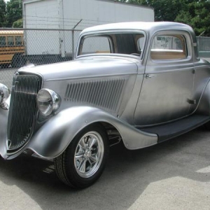 I'm in the top 10 of the waiting list for the new Reel Steel '34 Coupe from Steve's Automotive Restorations. This picture is from their website, body number 001 making the rounds this summer.

My delivery is in early 2009, I'm working on the planning right now.