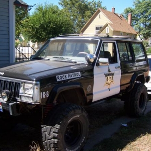 My jeep with my removable white doors and magnetic decals I made for it for taking it to shows