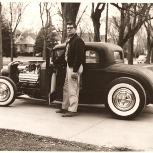 1958: Dad with his coupe (B&W)