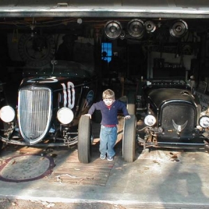 grandson Tyler wiyh old race cars