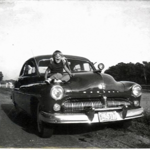 Our 1949 Merc with Jen on the hood in the early 70s