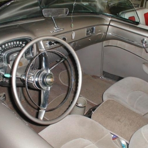 int of 1950 Caddy Roadster & interior of Model A roadster