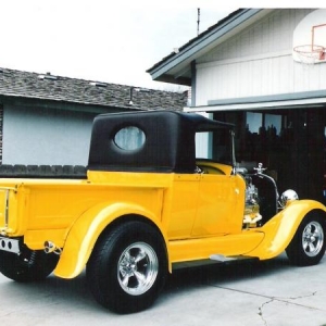 Taken in my brother's driveway the day I bought the car in 1995. We trailered the car home because the wiring was so messed up, I didn't trust it. This car was built sometime in the 70's in northern California. It was originally painted red. I'm still trying to find out who the builder was.