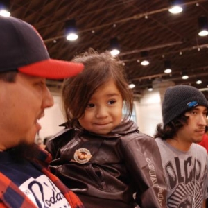 My nephew "little Larry" at his first car show. "BYE GEORGE,  I THINK HE LIKES IT!"