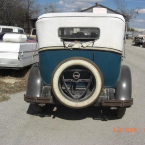 The rear quarter is a convertible top.