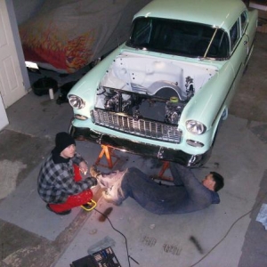 040 In the shop with my son Ryan getting the 55 back together for the Performance World Show 09.