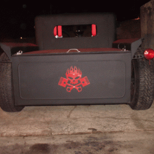 Custom steel sign on tailgate.  Wide and low.