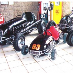 This is the lobby of the Justice Brothers Museum. The 93 midget is my Dad's 1947 Kurtis Kraft. The #1 midget is the Arlen Kurtis second generation Kurtis Kraft chassis #1 my Dad built in 1992. The #93 1/4 midget is the Kurtis I won the 1957 national championship in. These 3 race cars are very special to our family, and it means the world to me that they are preserved together in this awesome racing museum.