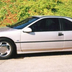 '90 T Bird Super Coupe 
 3.8 supercharged V 6, Eibach springs, cat back exhaust.
Love silver 'Birds. This one was fast!