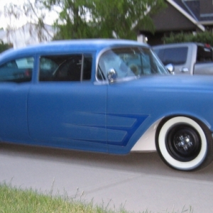 Blurry shot showing the new white wheel wells and spyder caps. June '09.