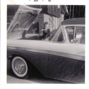 Turning wrenches on the family wagon (1957 Ford) in 1962.