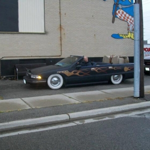 100 0412 You never know who will show up at the Hartman Bash......check out the recliner chairs in the back of this wacked Buick....lol.