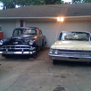 Photo 584 '54 with my wife's '61 Galaxie 2-door. Galaxie can go somewhere by itself.