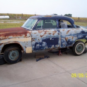 working on figuring the rear quarters out..... The mud was started by my father, he was going to remove the trim. Im going to put the trim on, so the bondo is coming off, and we are going to repair the rust with a metal patch.