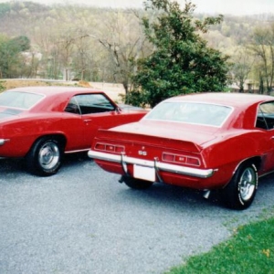 Musta liked red, 1969 SS350, original paint 1969 Z-28 and in the background red 1990 IROC I bought new.