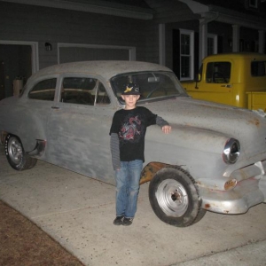 the latest, 54 chevy 210 pictured here with the project manager.