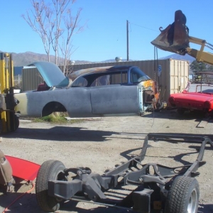 ok, All i have to do is  drop the body on the frame, no help this day! thats my ford backhoe on one end and my towmotor forklift on the other