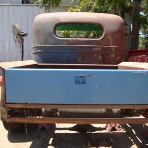 tail gate is pretty cool, comes off a service bed... I did not modify the gate, I just widened the bed to fit it! it give the truck a wider stance and it makes a triangke from the back of the truck to the front,  Next I will chop this thing 6"