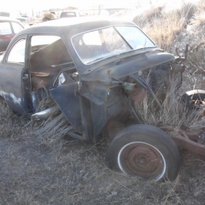 the rest of this car is burried in the weeds near by!